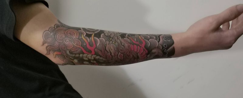 麒麟纹身图片_手臂老传统纹身图案