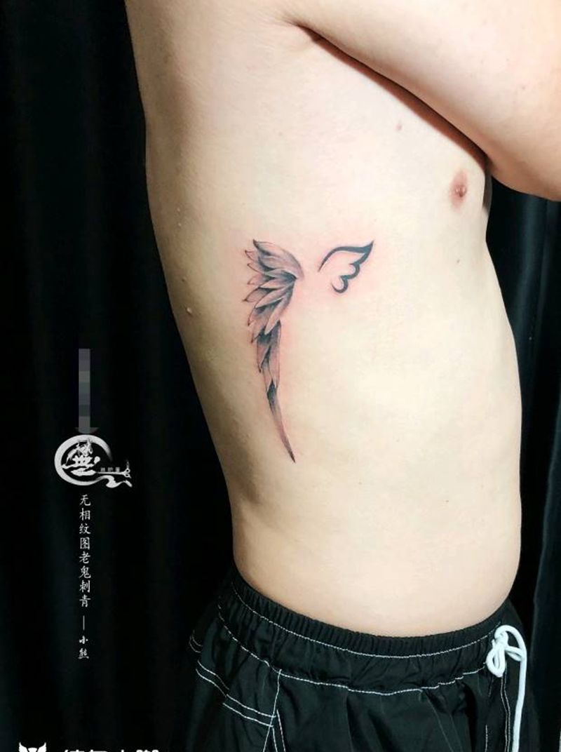 翅膀纹身图片_腰部纹身图案