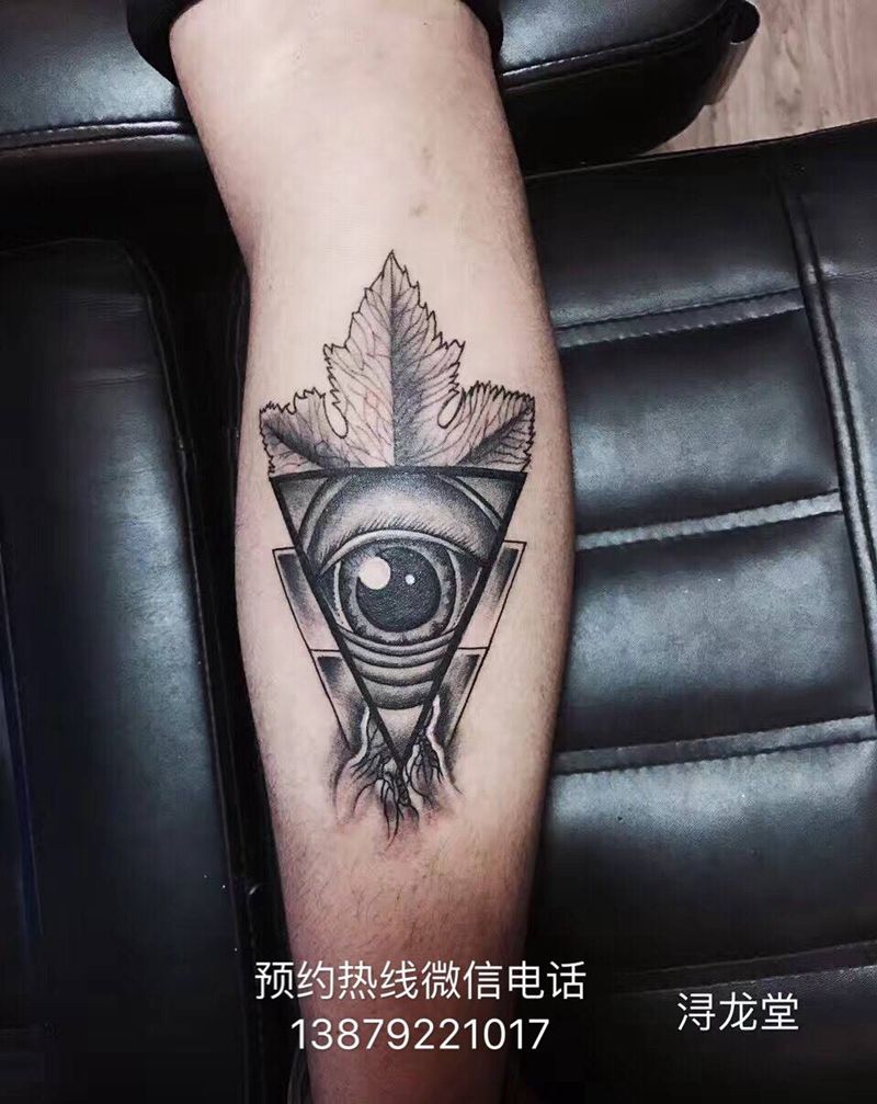 眼睛纹身图片_腿部脚部欧美清新几何宗教纹身图案