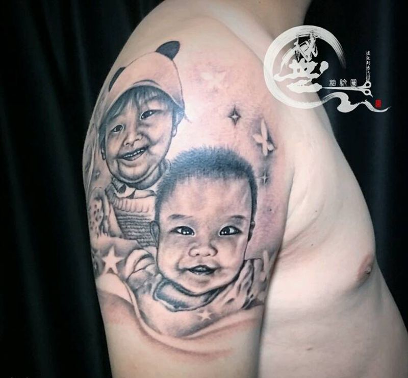 肖像纹身图片_手臂写实纹身图案