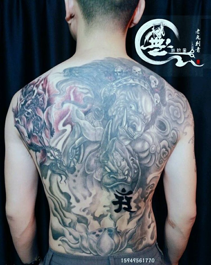 遮盖作品纹身图片_背部传统遮盖成品纹身图案