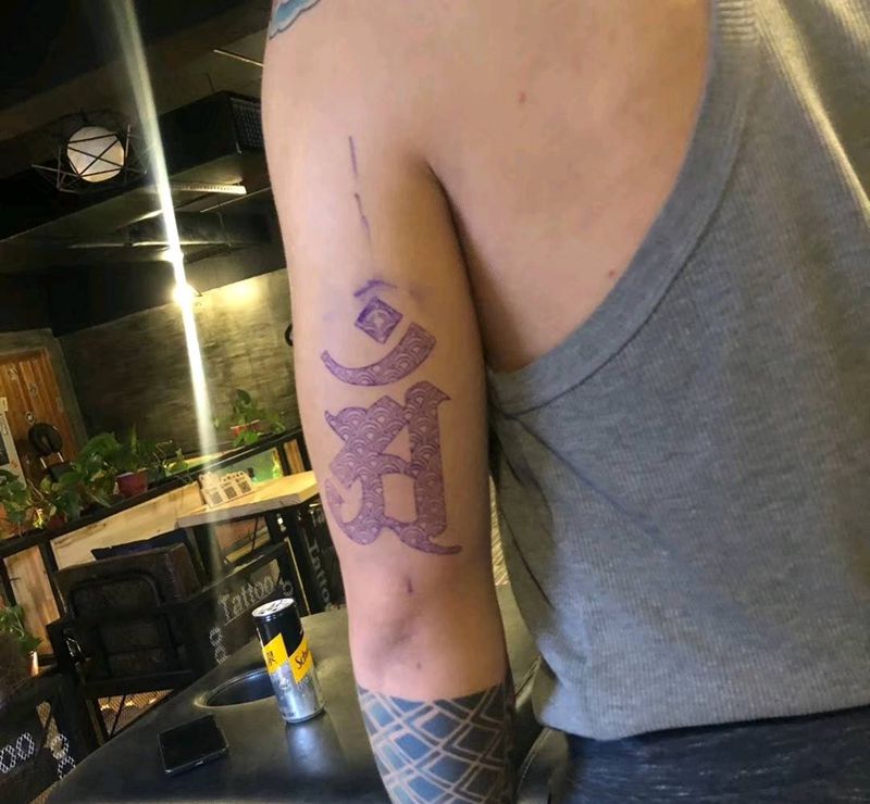 普贤菩萨纹身图片_手臂几何菩萨纹身图案