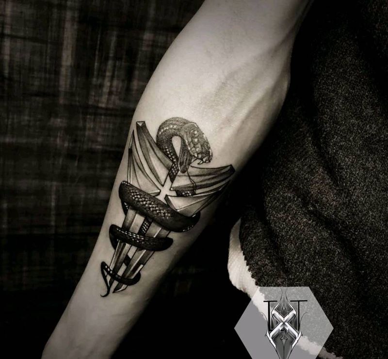 曼巴纹身图片_手臂纹身图案