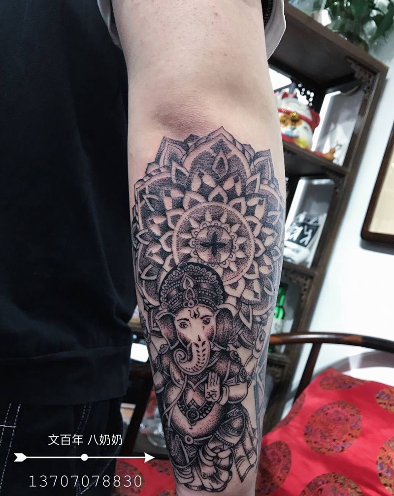 点刺象神纹身图片