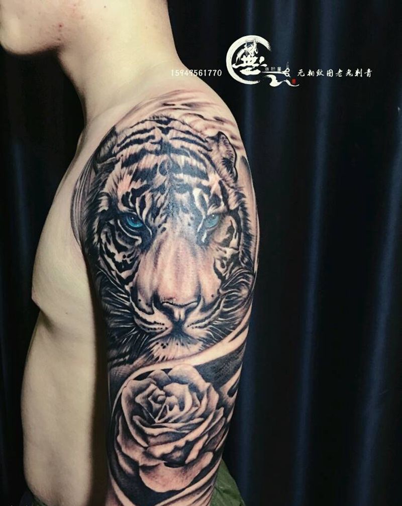 老虎纹身图片_手臂欧美写实纹身图案