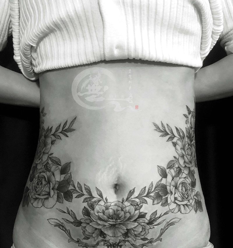 素花纹身图片_腹部纹身图案