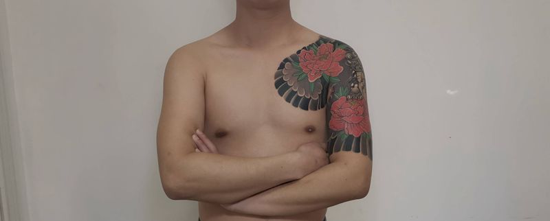 牡丹纹身图片_手臂老传统纹身图案