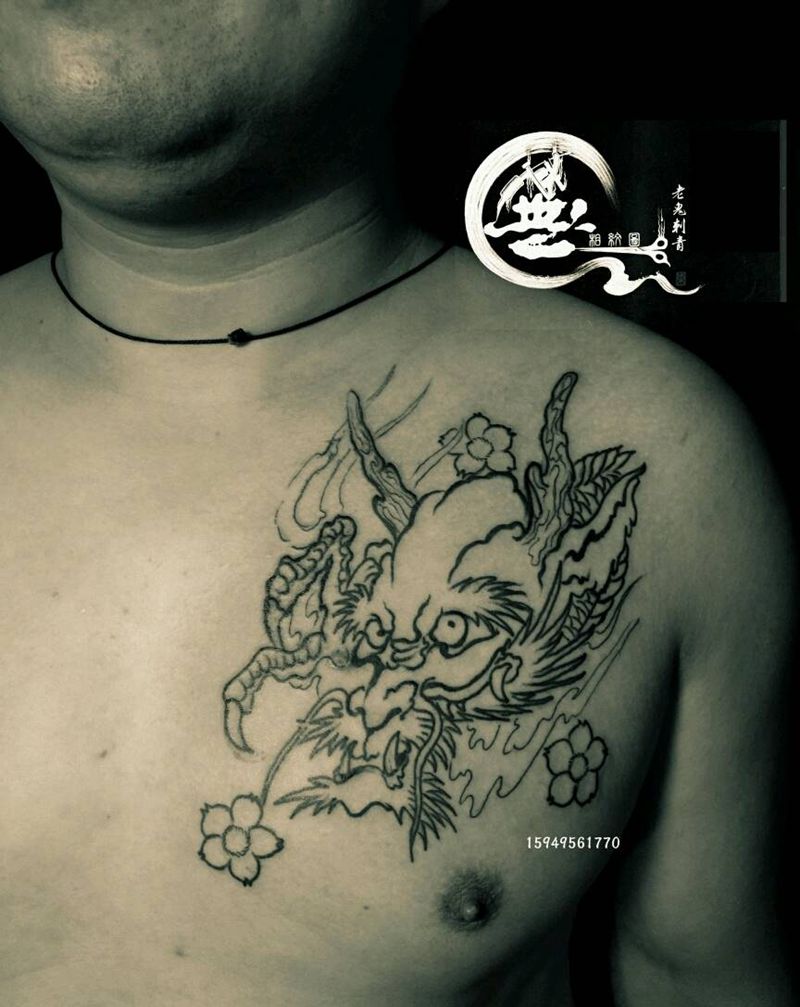 线条龙头纹身图片_胸部传统成品纹身图案