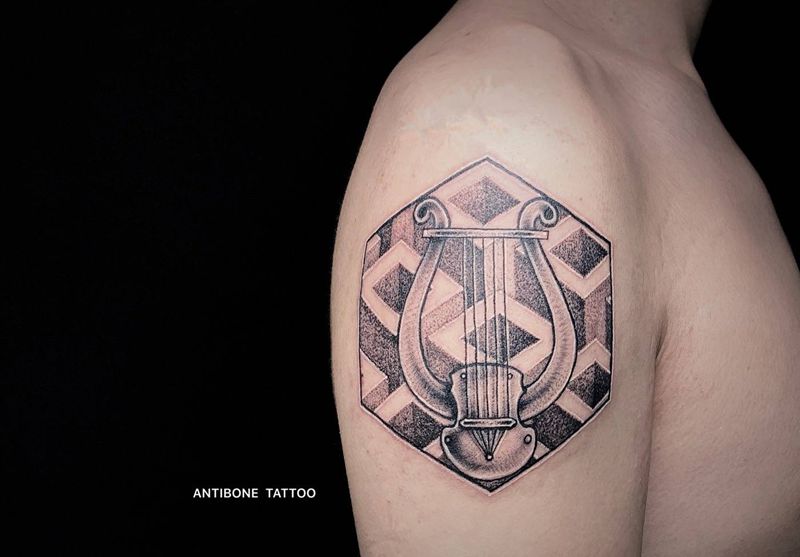 #里拉琴#纹身图片_手臂腿部点刺几何琴里拉琴纹身图案