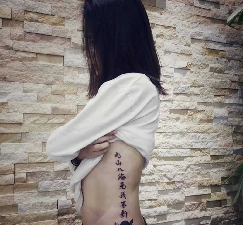 店照与客照纹身图片_成品腰部字符鬼神图腾纹身图案