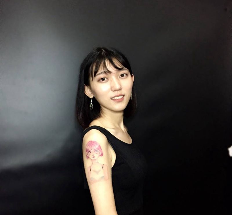 卡通粉女孩纹身图片