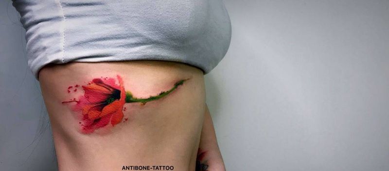 # 水墨罂粟#纹身图片_腰部腹部水彩水墨纹身图案