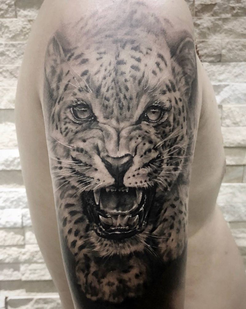 豹纹身图片_手臂欧美写实动物豹纹身图案