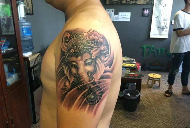 大臂象神纹身图片_成品手稿手臂传统写实人物鬼神宗教纹身图案