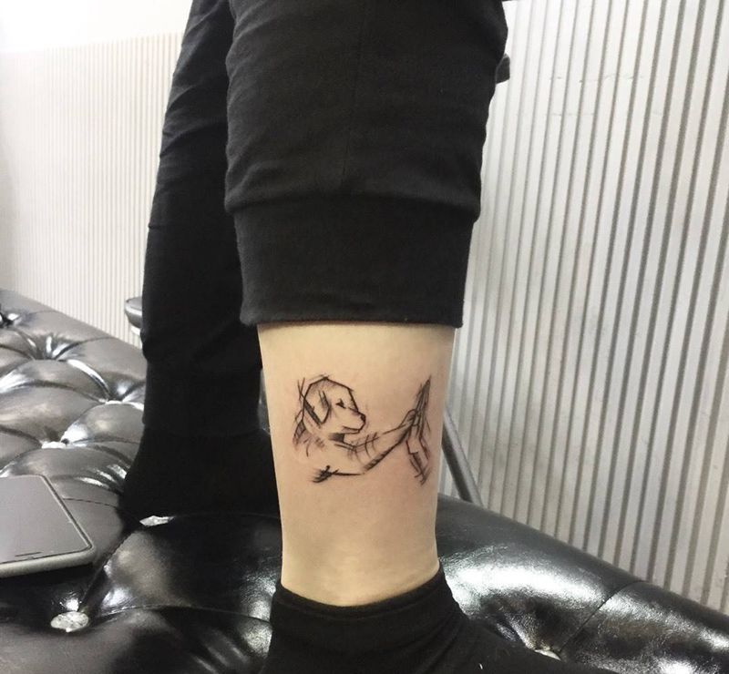 狗DD纹身图片_成品腿部脚部动物人物纹身图案