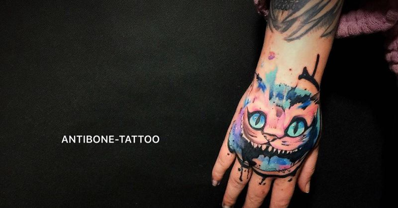 # Cheshire cat#纹身图片_成品手部欧美清新动物彩图反骨刺青纹身图案