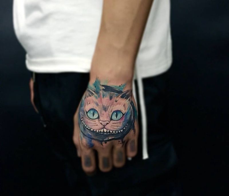 柴郡猫纹身图片_成品手部欧美传统动物鬼神呀呀刺青纹身图案