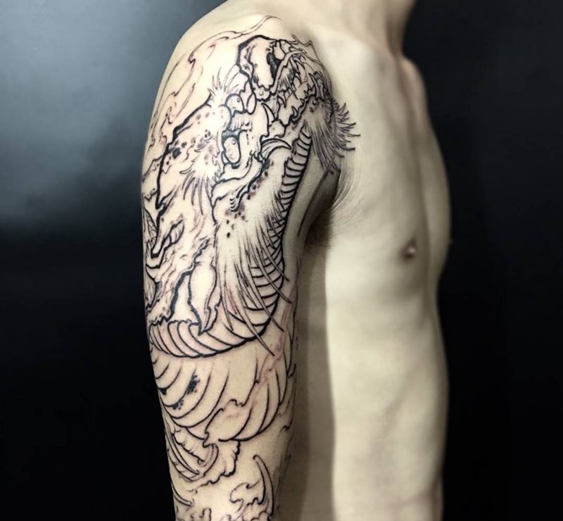 龙抬头未完成纹身图片