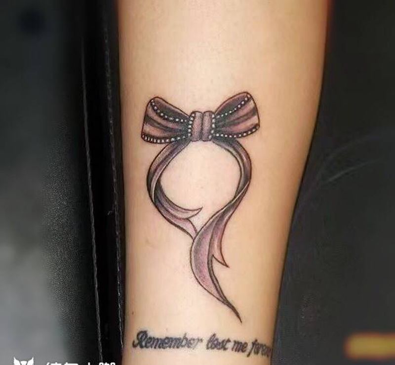 小作 蝴蝶结纹身图片_腿部新传统老传统纹身图案