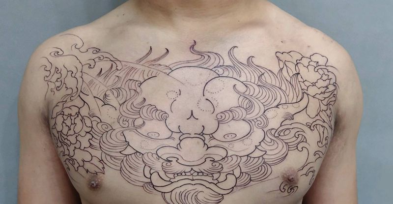 唐狮花胸纹身图片_胸部纹身图案