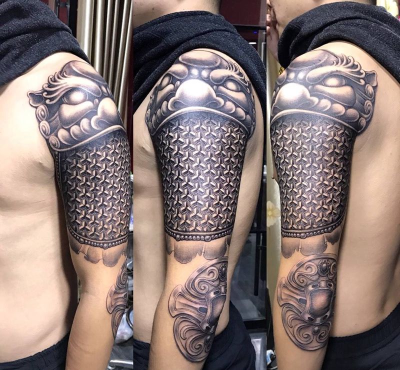 铠甲，未完待续纹身图片_手臂传统纹身图案
