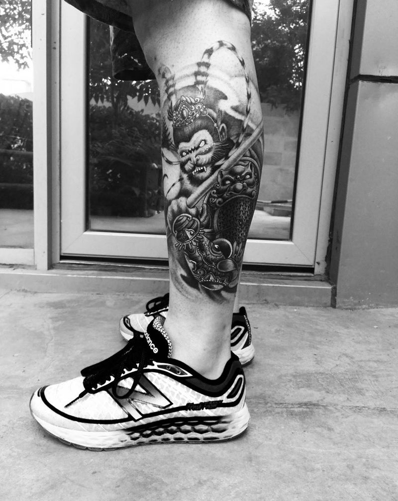 嗯哼纹身图片_成品腿部传统宗教纹身图案