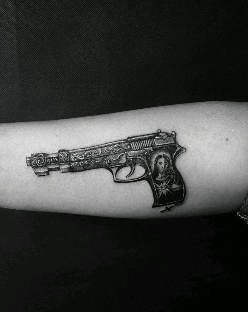 一把枪纹身图片