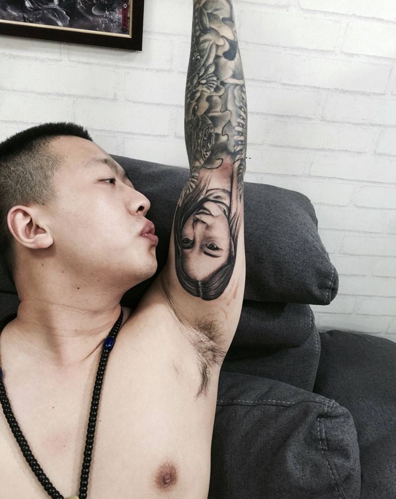 无题纹身图片_手臂肖像人物纹身图案