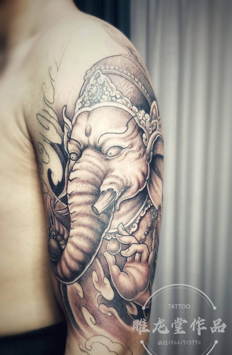 新传统象神纹身图片_手臂新传统象神纹身图案
