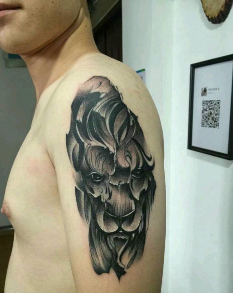 狮子纹身图片_手臂传统动物培训成品纹身图案