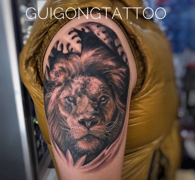 狮纹身图片_手臂欧美写实纹身图案