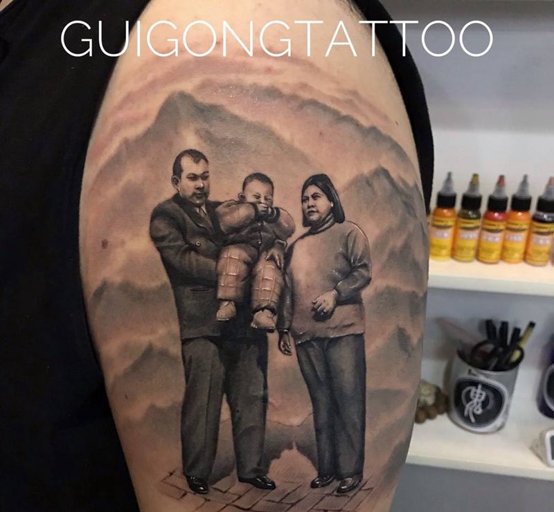 父爱如山纹身图片_肩部手臂欧美写实肖像纹身图案