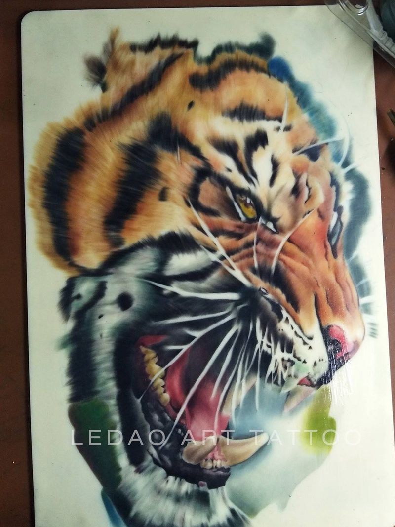 每个人都需要 一块磨刀石纹身图片_成品手稿肖像欧美原创动物手臂手部背部纹身图案