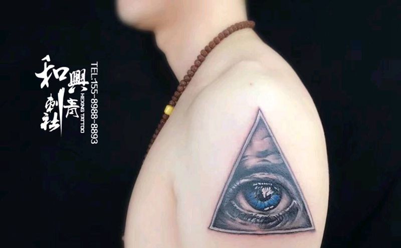 上帝之眼纹身图片_手臂欧美人物成品纹身图案