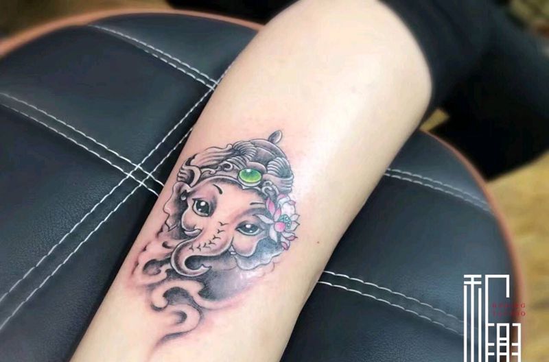 小象神纹身图片_腿部传统清新动物鬼神纹身图案