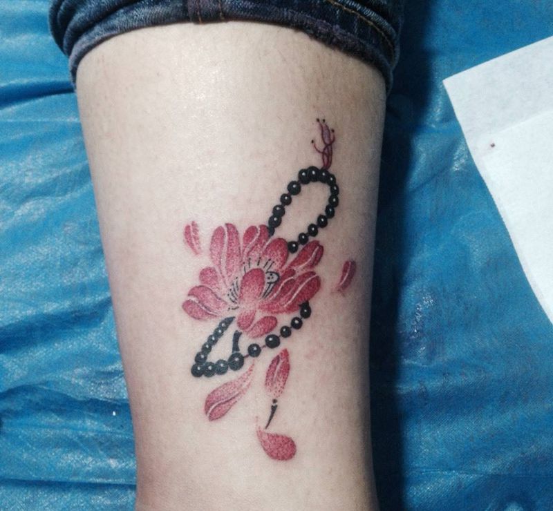 点刺，莲花佛珠纹身图片