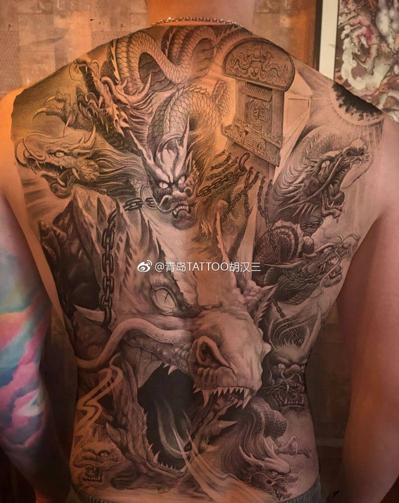 九龙拉棺纹身图片