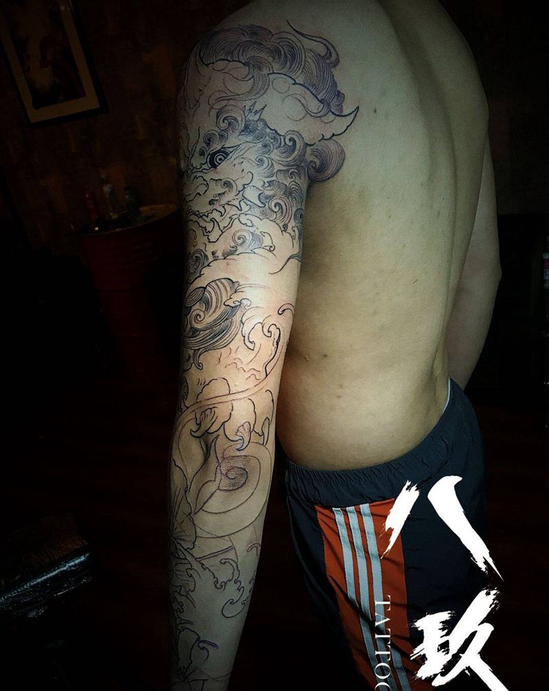 唐狮鲤鱼纹身图片