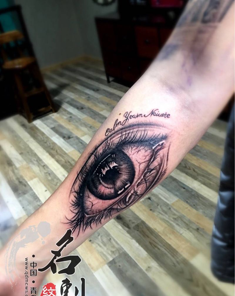 眼睛纹身图片_手臂欧美写实纹身图案