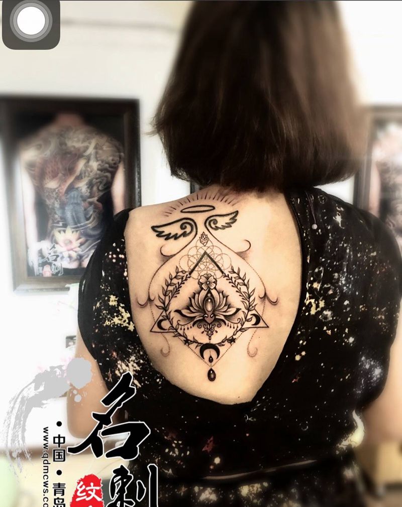 梵花纹身图片_背部点刺几何纹身图案