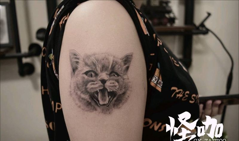 喵凶喵凶的哦～纹身图片_手臂纹身图案