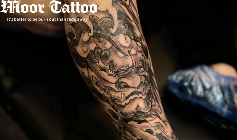 唐狮纹身图片_腿部传统静物成品纹身图案