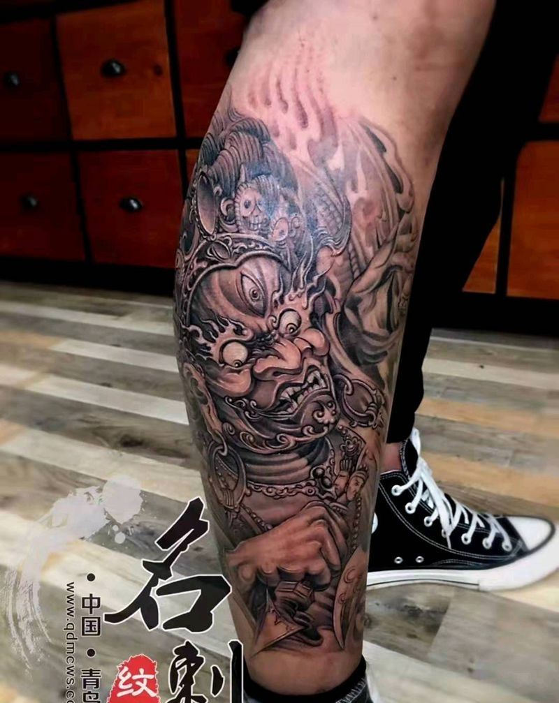 大黑天纹身图片_腿部新传统欧美写实纹身图案
