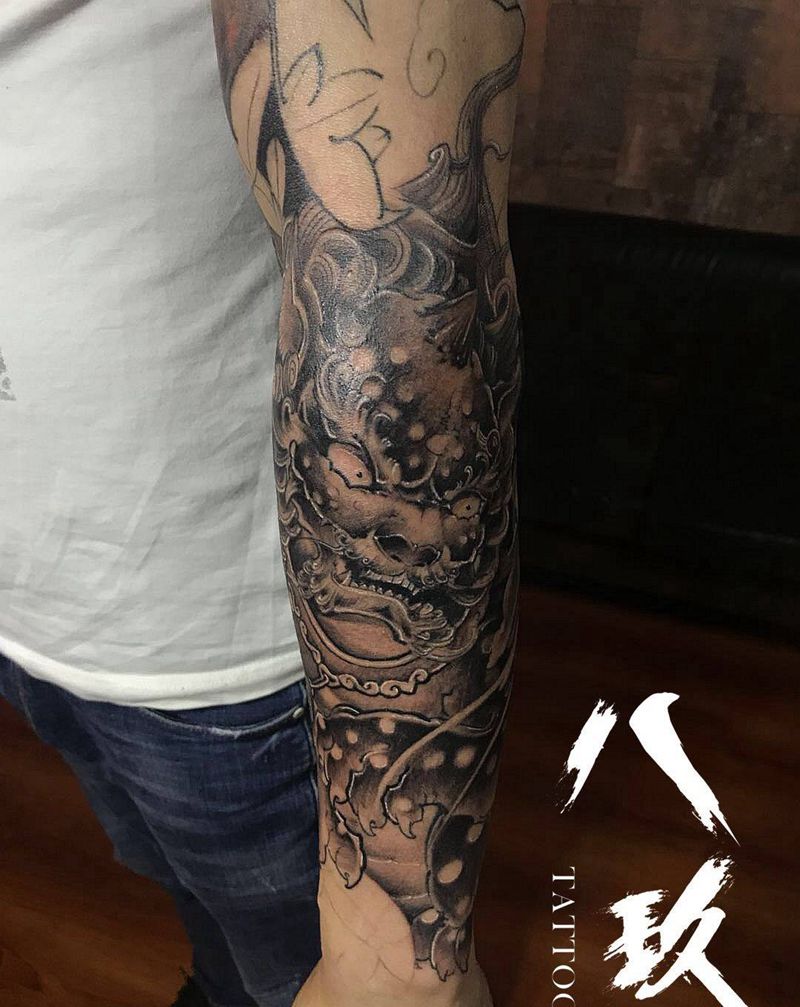 唐狮花臂未完待续纹身图片