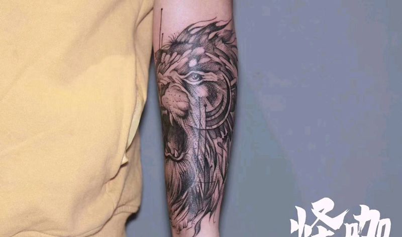 狮子纹身图片_手臂纹身图案