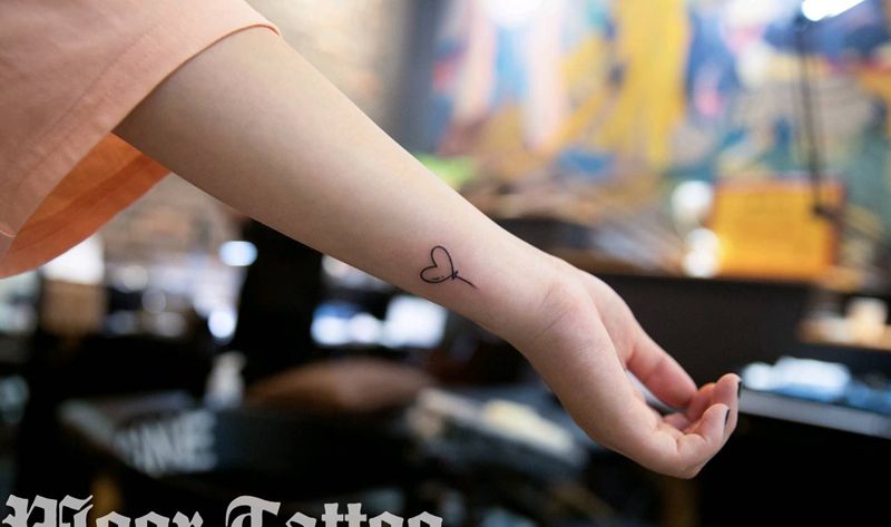 心纹身图片_手臂清新成品纹身图案