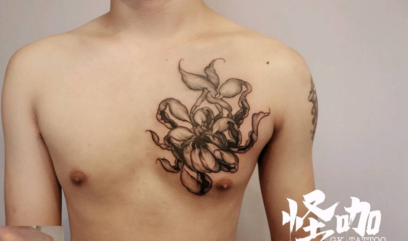 旧纹身遮盖纹身图片_胸部纹身图案