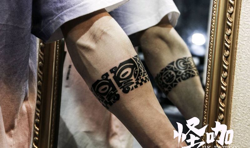 图腾-愿勇气伴随你披荆斩棘纹身图片_手臂图腾纹身图案