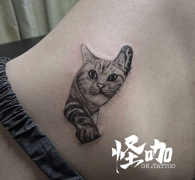 喵喵喵纹身图片_背部纹身图案