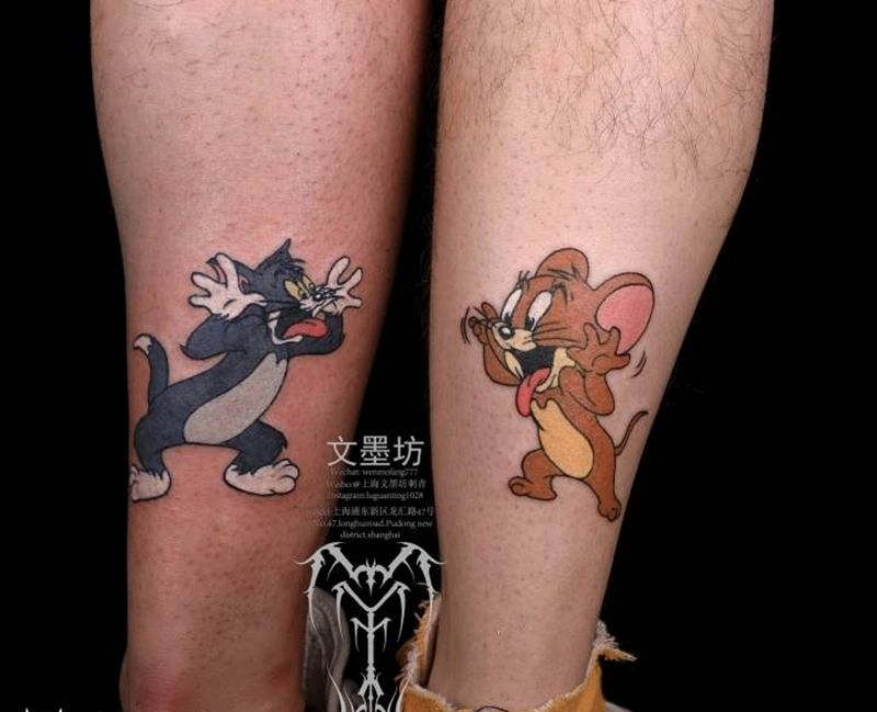 汤姆杰瑞纹身图片_腿部纹身图案